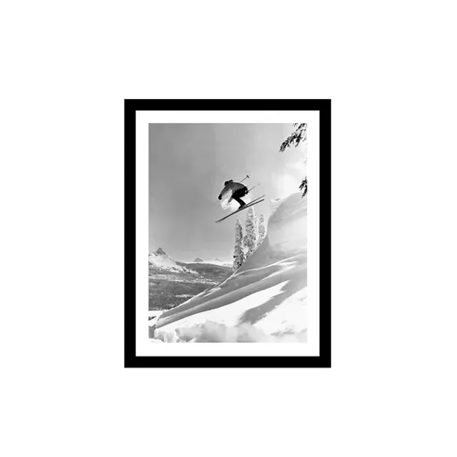Hovedbilde A skier jump off a ledge ...